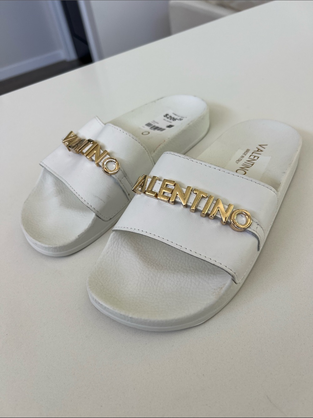 Valentino white leather open toe pool slides sandals with gold tone lettering 5